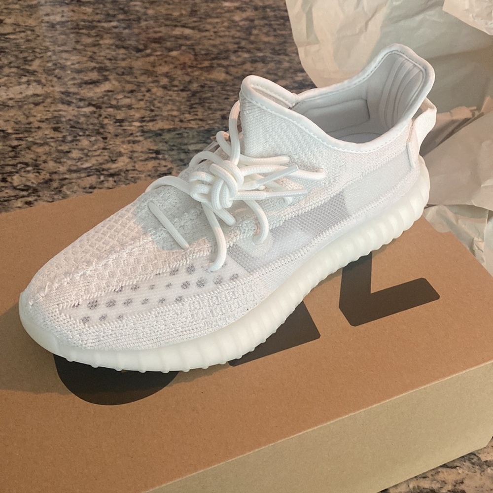 Yeezy 350 V2 Bone white.    Not new. Slightly worn.